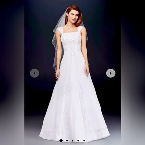 Elegant A-line wedding dress. Never worn.The dress retails for $599